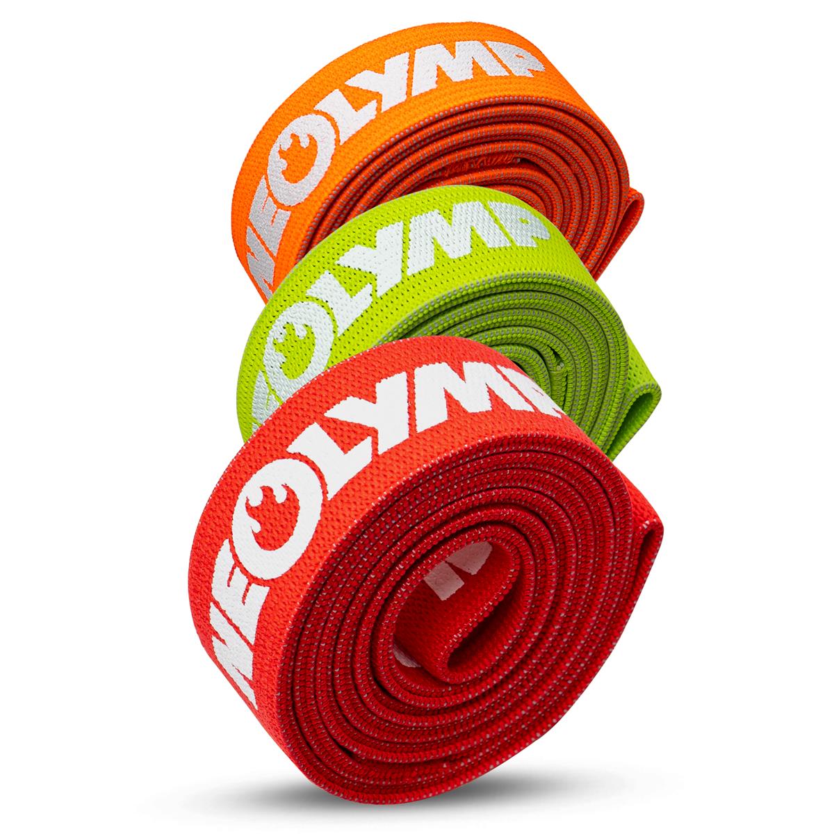Drei Widerstandsbänder in den Farben Orange, Grün und Rot, aufgerollt und bereit für das Training.